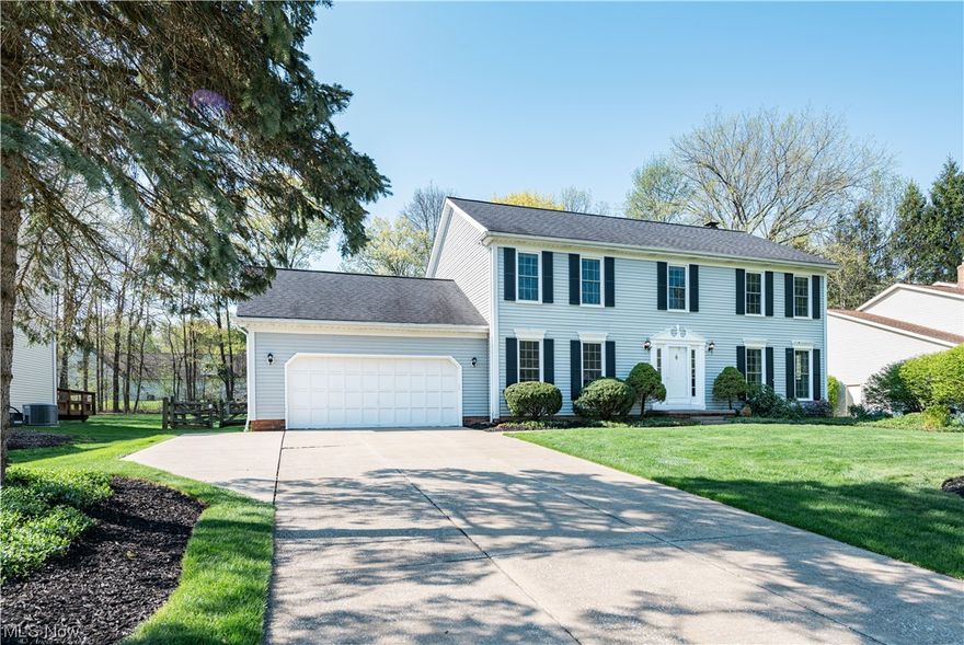 This neutrally decorated center hall colonial comes with a private fenced backyard and vegetable garden. Your new kitchen has granite counter tops, a new gas stove (2020) and center island adding additional storage and work space.  The bayed eating area allows in so much natural light. Enjoy family nights in the connected family room with brick fireplace and slider to the large deck.  Not to be missed is the 19x13 office or play room addition (1995) with a cathedral ceiling and doors to backyard/deck.  The second floor Owner's suite features a walk in closet and a glamour bath with double sinks, a soaking tub and separate shower 2015.  All bedrooms are spacious and carpeted.  The walkout lower level has a recreation room and two additional finished rooms. Updates include roof 2009, all new windows 2014, Quartz sink & new title floor in hallway bath 2020, deck stained 2020.The backyard shed base enforced in 2020 for extra storage. All appliances stay. New A/C 2020. This property is move