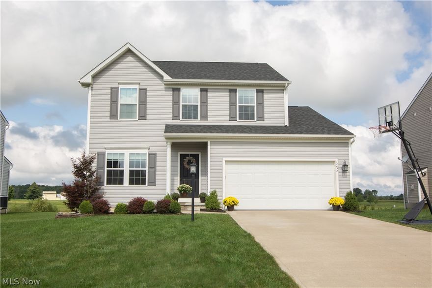 As soon as you pull into the beautiful Shale Creek development, you will instantly feel relaxed.  Then, as you pull into your driveway and see the golf course view you will be so happy you have made this home.  Built in 2011, this 4 bedroom 2 1/2 bath home has a fabulous floorplan. New laminate hickory wood floors on the main level lend to the clean, updated décor.
The expansive kitchen is open to the dining room and living room area. The kitchen boasts beautiful cabinets, plenty of cabinet space, a pantry and gorgeous island.  The formal dining room is expansive.  You will enjoy the laundry room on the main floor.  Upstairs you will find a loft that can easily be made into a 4th bedroom.  The Master suite is spacious with walk-in closet and Private Bathroom.  Bedroom #2 and #3 are perfectly sized. The lower level is unfinished and awaiting your storage or finishing needs. Enjoy evenings outside with the beautiful view of a lake and the Golf Course.  Your HOA fee covers the use of the