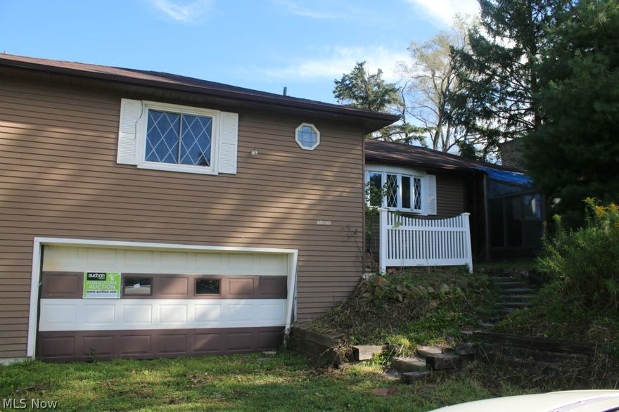 3 Bedroom, 2 bath Convential Home on 3.25 acres. Living rm, Family rm with brick fireplace, kitchen, dining rm with slider that leads to large deck. Full basement, multi barns/sheds on property. 2 car attached garge and 3 car detached garage.