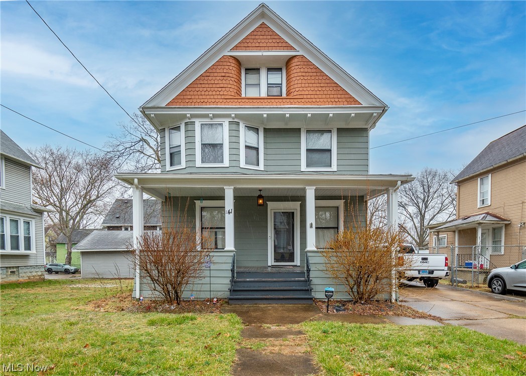 Welcome to 141 Rhodes Avenue! Don't miss this 4 bedroom, 1 bathroom colonial sitting on a double lot near Highland Square! Enjoy your character-filled main level featuring newer hardwood floors, a fireplace, and a recently updated kitchen with 2019 stainless steel appliances. Laundry is conveniently located on the upper level next to the three main bedrooms, all with new carpet. There is an additional living space in the attic that can be used as a fourth bedroom or storage space. Spend your summer evenings relaxing on your front porch or entertaining in your oversized backyard. Newer furnace and roof. Many new windows throughout offering loads of natural light from all sides of the home. Extended driveway allows for extra parking in the back. Schedule your private viewing today!