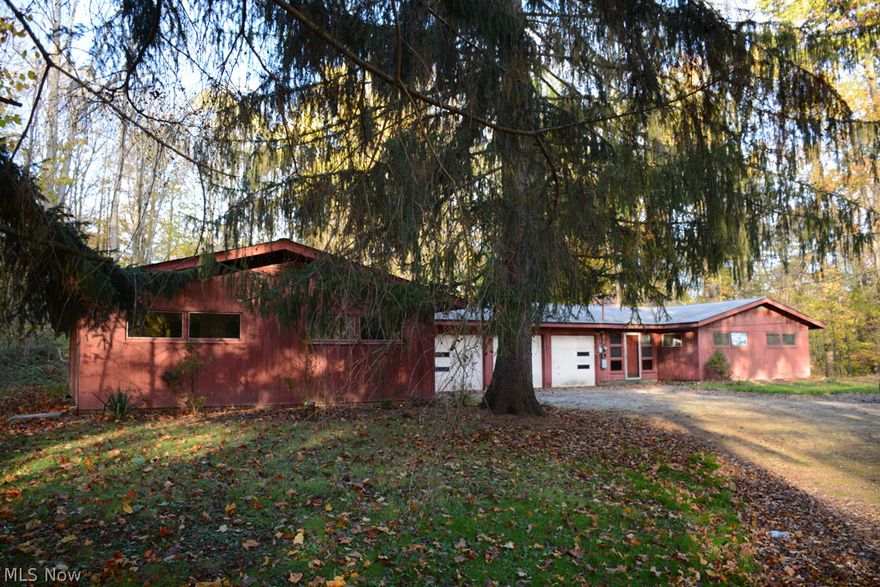 Was duplex/ Garages separate units/ Zoning may view use as duplex if title transfers prior to Novemeber 15, 2015/ After that date, use may revert to single family use only/ Home does need work/ Buyer to assume septic and "as-is" condition/ Great view of valley