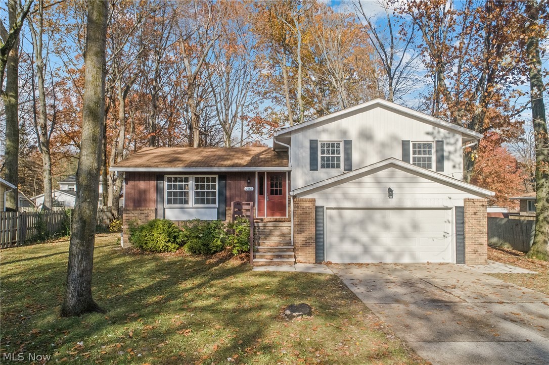Not to be missed! This delightful move-in ready 3 Bedroom, 2.5 bath, split-level home in the heart of Stow has been updated from head to toe (2021) and is ready for its new owner! The entire interior has been repainted in a fashionable neutral palette, and all flooring and carpeting has been replaced. The Living room features loads of natural light and flows beautifully into the formal dining room and fully-applianced updated eat-in kitchen with newer cabinets, counters, flooring, sink, and fixtures. Upstairs are two ample bedrooms with large closets and a completely renovated bathroom with vinyl plank flooring, vanity, fixtures, commode, bathtub and tile surround. The large master bedroom has a full en-suite bathroom that has also undergone a full transformation. The lower-level Family room features a wood-beam ceiling, pleasing wood-burning fireplace, and an adjacent half bath that has also been updated! From the Family Room, the sliding-doors open to a cozy patio overlooking the fen