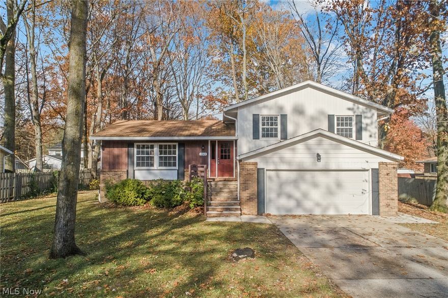 Not to be missed! This delightful move-in ready 3 Bedroom, 2.5 bath, split-level home in the heart of Stow has been updated from head to toe (2021) and is ready for its new owner! The entire interior has been repainted in a fashionable neutral palette, and all flooring and carpeting has been replaced. The Living room features loads of natural light and flows beautifully into the formal dining room and fully-applianced updated eat-in kitchen with newer cabinets, counters, flooring, sink, and fixtures. Upstairs are two ample bedrooms with large closets and a completely renovated bathroom with vinyl plank flooring, vanity, fixtures, commode, bathtub and tile surround. The large master bedroom has a full en-suite bathroom that has also undergone a full transformation. The lower-level Family room features a wood-beam ceiling, pleasing wood-burning fireplace, and an adjacent half bath that has also been updated! From the Family Room, the sliding-doors open to a cozy patio overlooking the fen