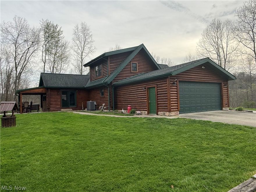 Custom built 2 br 2 bath log home with many special amenities, the extravagant stone fireplace and cathedral ceilings and open floor plan with log staircase leading up to the master suite with large walk-in closet and full bath and small office space to work from home is an added plus.   Or the gourmet kitchen w new granite countertops tops and breakfast bar welcome the morning plus there’s an additional washer dryer hookup just off the kitchen area and full bath and first floor bedroom if needed.   There’s a formal dining room that over looks the back yard with a French door that leads out to the covered back stone patio with fire pit that you can enjoy your 1/4-1/2 stocked pond while drinking morning coffee or entertaining guests.  The full walkout basement has a family room with wood burning fireplace and additional area for another bathroom w plumbing stubbed in and laundry down and workshop area and ample storage.   The home has county water and well water, many buildings outside for the animals which about 30 acres is fenced with electric and lifetime fencing.   There’s a detached garage w  carports on both sides for storage a 5 bay machine shed a wood shed and workshop w heat and cooling.     The home could have an additional bedroom and bath in the basement if you want to finish the area off.  Plenty of trails on the property and hunting blinds. Free gas to house.   SELLER TO RETAIN MINERAL RIGHTS