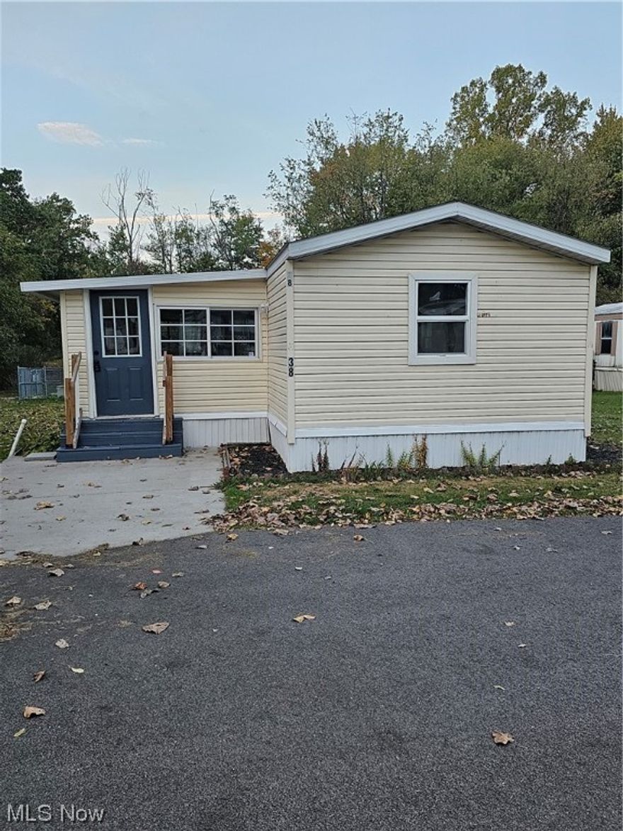 Welcome to this cozy two bedroom home located in Mayfield Mobile Home Park. Looking for affordable living & ready to move in?  This home has a beautiful kitchen along with two bedrooms with lots of closet space, laundry area with washer & dryer. Screened in encloseed porch. The home is setting on a nice corner/ end lot in the city of Green. Conveniently located near essential amenities, schedule your showing today! Shed is negotiable. Being sold as is, seller to make no repairs

All applicants must be approved by park owners, lot is leased. Trash sewer & water is included with the lot rent. Lot rent is currently $480.00 per month.