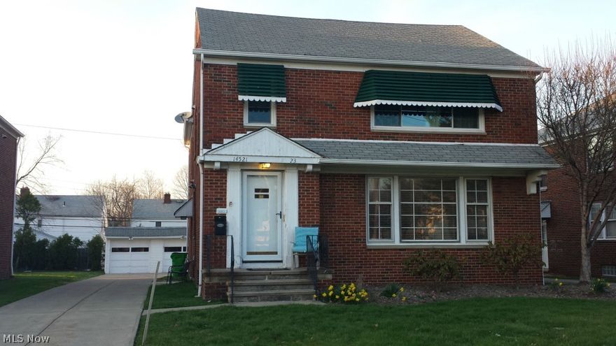 Income producing opportunity!  Wonderful 2 family all brick home w/detached 2 car garage. 1st & 2nd floor offer same floor plan, but separate utilities (2nd floor currently rented). Two separate entrances for both spaces. Front entrance offers slate tile floor. Side entrance has hallway to both units and basement. Both units offer: large living room w/walk in closet, eat in kitchen w/appliances and lots of cabinets, formal dining room w/built in china cabinet, 2 bedrooms, full bath and porch.  Shared basement has glass block windows, loads of storage (some space lockable), half bath, and common finished room (25x13). All separate utilities including washer and dryer. Outside there is a two car garage and a separate parking pad.  Easy access to highway and close to shopping!