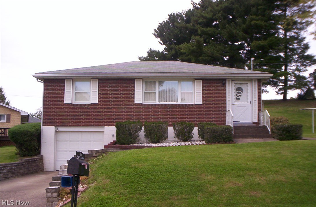 Weirton Heights. 2-3 bedroom brick ranch. Looking for that perfect starter home or to downsize. Look no further!! Living room, kitchen, 1 car garage, updated electrical box and equipped kitchen. Possible 3rd bedroom lower level. Very well maintained. Call Joann Soon !!!