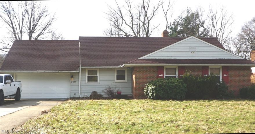 What an addition to your investor portfolio! Partially renovated bungalow in residential Euclid, just a few blocks from Indian Hill elementary school.  There is plenty of living space with room to renovate and grow!  The two full bedrooms on the first floor include an oversized primary with en suite bathroom and an additional generous sized bedroom.  The fully renovated galley kitchen has enough room for a breakfast table but families needing more room can spread out in the adjoining designated dining area. The living room boasts a floor to ceiling brick fireplace, large picture windows and access to the covered rear porch / patio.  The finished basement living space includes a full bath and built-in bar with additional space designated for laundry and storage.  Two car attached garage, large yard, great neighborhood -  whether buying as investment or as your future home, this property has much to offer!  
This property is tenant occupied through January 2027 at $1600 per month.