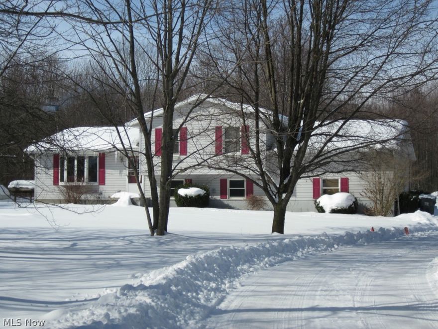 Four level split, 3 bedroom, 3 full baths, family room with wood burner fireplace, open kitchen, dining room, living room, basement. Wooded lot, large rear deck.