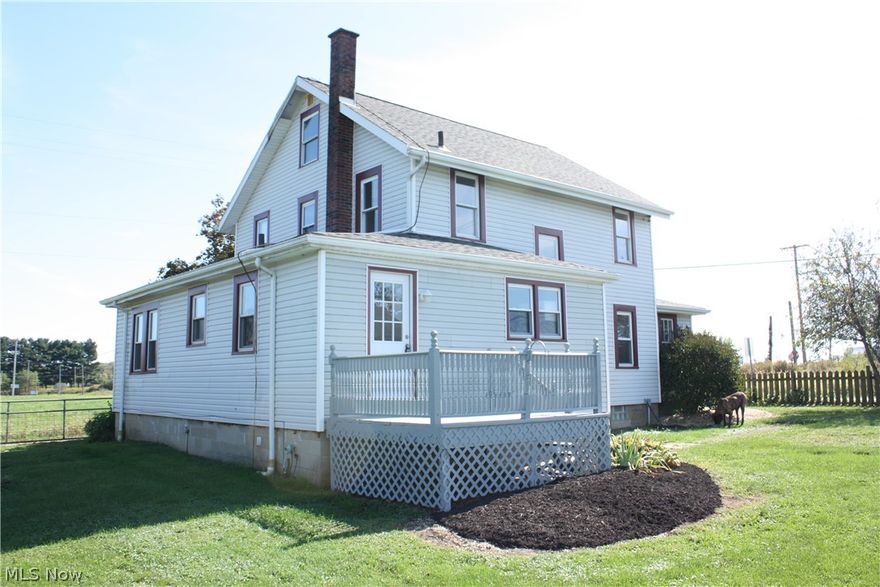 Have you ever wanted to live in a renovated farm house? Now is your chance! 10583 Beeson St NE, Alliance, OH 44601 is a wonderfully updated 3 bedroom, 3 full bath home with over 1800 square feet of living space and a beautiful 1.27 acre lot with amazing views, in-ground heated pool and HUGE 6 car garage! So many recent updates, which you’ll notice right away, like the freshly painted walls and ceilings throughout the entire home. The open concept layout, new kitchen ceiling, flooring in foyer, ceiling fans, updated plumbing, and 3 new exterior doors were all completed in May. The kitchen was updated in July with spectacular quartz countertops, which offer bar seating, plus a new sink and faucet. 2 bathrooms received a complete overhaul in September, each updated with brand new shower, tub, vanity, lighting, toilet, and flooring. You will love the natural hardwood floors, which are original, plus the new luxury vinyl planks. The exterior of this home is just as beautiful. The pool house was renovated in September also with freshly painted walls and ceiling, crown and base molding, flooring, and fans. Enjoy the 32 x 16 heated pool while taking in the views! And don’t forget the extra storage in the enormous garage which has room for 6 vehicles and has 2 loft areas. If that wasn’t enough, there’s also a small, fruit-bearing orchard in the back with a few apple trees! Schedule your showing now. Country living awaits you!