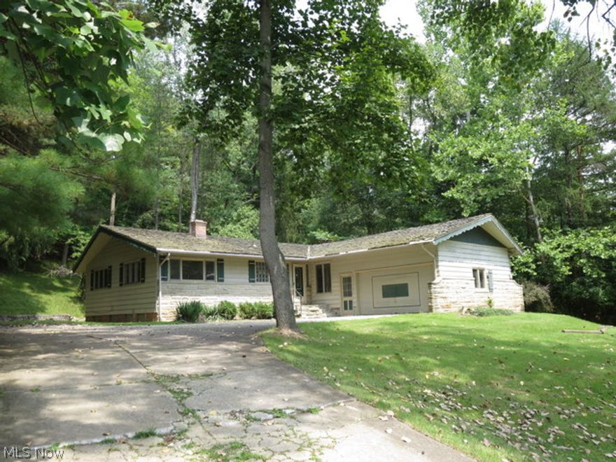 Ranch style home with 3 bedrooms and a bath and 1/2 on over a half acre just waiting for a motivated buyer to bring it back to its full potential. Living room has a brick fireplace with a cathedral ceiling. Large eat-in kitchen Large deck in the back yard and a full basement. Attached 2 car garage. This is a Fannie Mae Homepath property