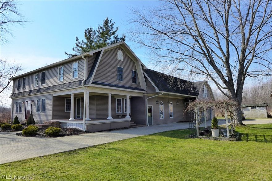 This 5 Bedroom, 5 1/2 Bath Modern Dutch Colony on over 8 acres had been the culmination of a dream for this owner.  Built to both raise his family and serve his contracting business, this country estate is a wonderful mix of family home, country estate with the space and buildings to make it a perfect fit for a contractor who needs storage as well!  Home has Central Vaulted two story Great Room with staired lofts which splits the home into two large wings, each with a Master Bedroom and Master Bath.  Radiant floor heat in Garage and Shop make this part of the home just as comfortable as the living areas.  Outside, the lengthy Stamped Concrete Drive and Front Wrap-Around Porch both are accented with custom lighting.  There is a large barn with 6 stalls and property served as horse property in its past.  Remote Whole House Wood burner on Property as well as gas storage for vehicles.  Additional workshop/storage on front of property as well as fenced garden and Potting Shed.  Call for mor