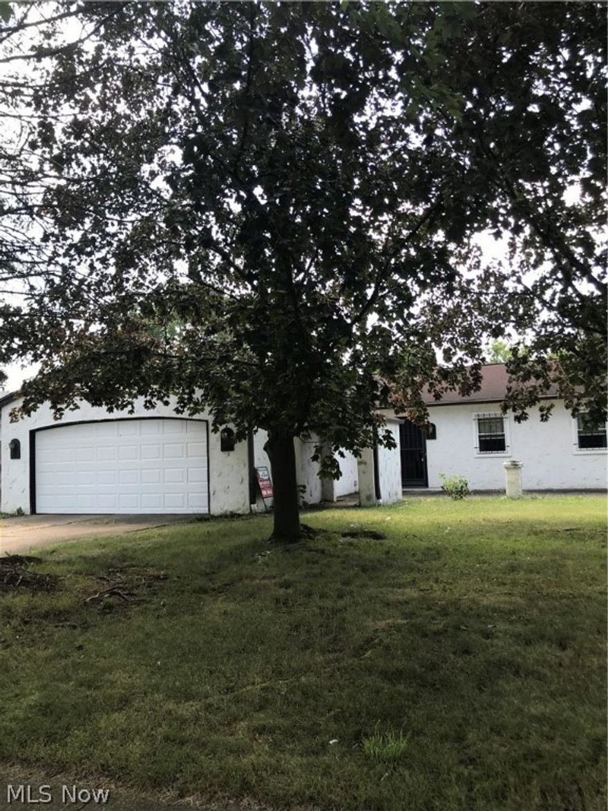 Make this property your own! This 3-bedroom ranch has so much potential. It is spacious with a living room and a family room. The family room has a fireplace and sliders out to the deck.  The kitchen is open to the family room as well. It has one full bath and a half bath. There is an attached 2 car garage. The backyard is fenced and private. The roof is approximately 7 years old. The seller is selling as is.