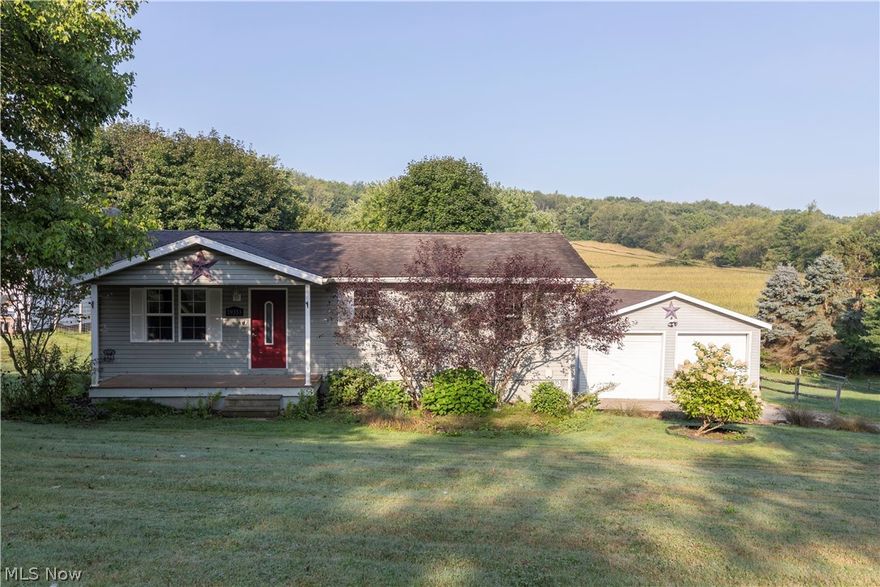 Beautiful country setting for peaceful nights out on the deck that has a hot tub and gazebo area.  This 3 bedroom ranch has a nice size eat in kitchen and all kitchen appliances stay.  Nice size master bedroom has walk in closet and full bath with linen closet/storage area.  3rd bedroom is off kitchen and can be office or small bonus room instead.  Finished basement makes a great ManCave or extra living/bedroom space/rec. room.  Walk out basement has French doors onto the driveway.  The 4 car (double deep) garage can accommodate all your extra toys, plus has a nice work area.  House comes complete with water filtration system, radon system, newer roof, furnace, A/C and water tank.  Deck is being pressure washed and restained.