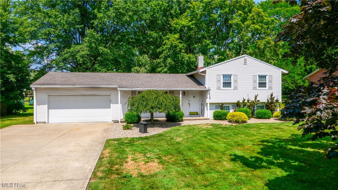 Welcome to this inviting split-level home offering 3 bedrooms and 1 full bath. The updated kitchen features a breakfast bar and opens seamlessly to the dining and living rooms, making it perfect for everyday living and entertaining. Enjoy the warmth of hardwood floors throughout the main level and a large picture window in the living room that fills the space with natural light. A sliding door leads to a 2-level spacious deck, ideal for relaxing or hosting gatherings while overlooking the large backyard.
The lower level boasts a generous family room with LVT flooring and a cozy wood-burning stove, along with a dedicated office and laundry room, and includes a separate shower perfect for furry friends or muddy feet. Upstairs, the hardwood floors continue. You’ll find three comfortable bedrooms and a full bath.
With its thoughtful updates, versatile living spaces, and wonderful outdoor area, this home is ready for you to move right in!