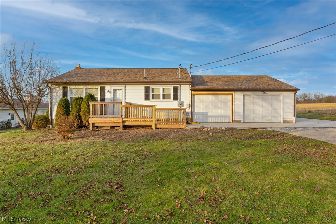 This two bedroom ranch has been recently updated and is move in ready! The fully renovated kitchen contains Craft-Made cabinets with slow close drawers, new led lighting, backsplash, and all new stainless appliances. The home has new LVP flooring, new carpet, updated led lighting, and fresh paint throughout. The attached two car garage has new doors, as well as a rear door that leads to a freshly poured concrete patio with vast country views. Located conveniently near the Austintown Township park and the Metro Parks Bike Trail. Roof is less than five years old; New gutters, downspouts and drain pipe to street; 200 amp electric service; New hot water tank. Waterproofed full basement with transferrable warranty from Ohio State Waterproofing. Home Warranty included for peace of mind.