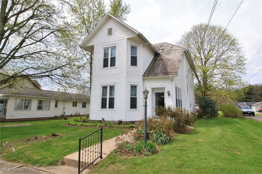 Grand home with lots of charm, beautiful woodwork and so much more! Lovely, updated kitchen features an abundance of cabinets! You don't want to miss this one! One  year home warranty will be included! Newer windows.  Barn type garage has attached screened porch plus and upper level for storage or game room! Water shed assessment is $6 per year. Dresden Lighting assessment is $32.78 per year. Homestead reduction is $352.06 annually.