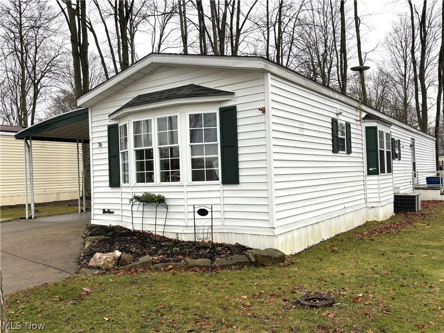 This absolutely beautiful mobile home is completely remodeled. As soon as you enter the front door, you will be impressed with the relaxing and comfortable decor. New flooring and carpeting, new light fixtures, and all walls freshly painted. Kitchen cabinets give it a sleek modern feel. All appliances included, and stackable washer and dryer. New kitchen countertops being installed as well as new bathroom sink and counter. Primary bedroom has double closets and new ceiling fan. Second bedroom currently being used as sitting room. Second bathroom includes walk in shower. Additional storage throughout home. Gas furnace and central air for year round comfort. Carport and shed for extra storage. This Victorian model home is located in Southern Terrace Mobile Home Park, a 55+ community. Purchasers must be approved by park management. For additional information, contact park manager. Lot rent is $499 monthly and includes trash service.