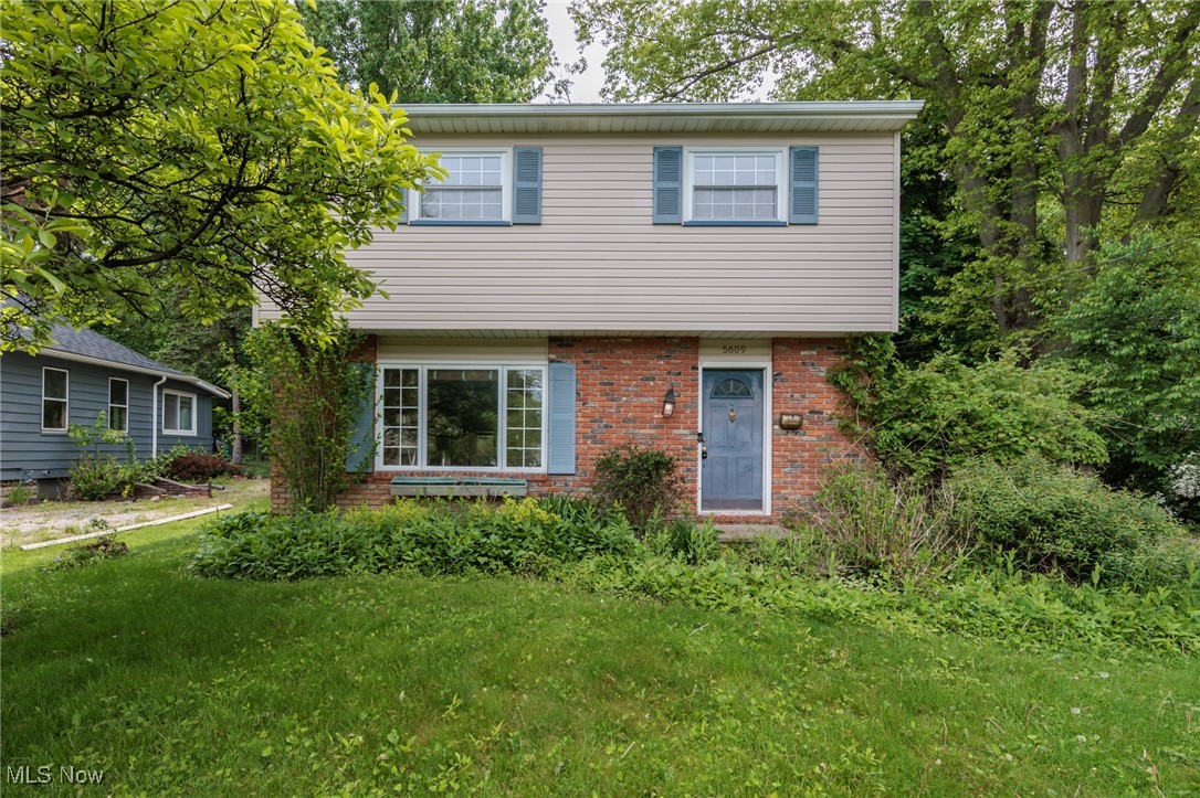 Who is ready for this? This property is a GEM for the right buyer. Colonial nearly 1700 sq. ft. on a slab now available for your viewing. First floor living room, kitchen, open dining area, cozy great room addition with high ceiling, first floor laundry with half bath and side door entrance/exit to patio area and fenced yard. The second floor offers full bathroom with tub, huge master and 2 great size bedrooms with much closet space. Outside offers large fenced in backyard with pool (2015), shed, large patio area and loads of privacy with the green space that is beyond the fencing that is landlocked and owned by the city. This place could be brought back to its full potential and ready for its perfect buyer that is willing put in some sweat equity!! This needs top down painting, flooring, fixtures, air ducts cleaned out, possible kitchen/bath updates and exterior clean up AND at this price its worth it. Come check it out!