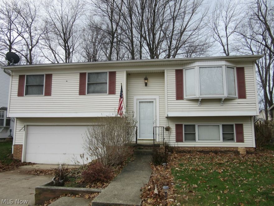 Wonderfully spacious home with many updates! Newer floors throughout. All newer appliances. Freshly painted. Pella windows throughout the home as well as central air. Maintenance-free deck great for entertaining. Large backyard surrounded by a privacy fence. Large rooms including a lower level family room. Large 2 car attached garage. Updates include water heater (2014), waterproofed basement (2011) and furnace (2008). All appliances stay. America's Preferred Home Warranty included. Ready for new owners to move right in!