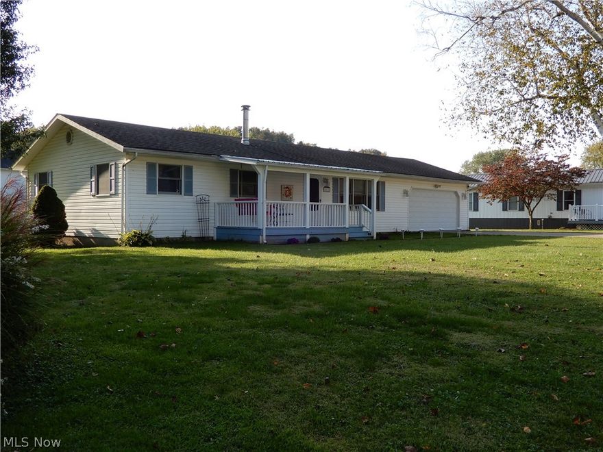 You will love this gorgeous 2 bedroom with a bonus room that could be used as a third bedroom or den/office. The kitchen (with cherry cabinets) and dining area are combined but very spacious. Perfect for family gatherings! In the summer you can enjoy the huge back deck or sip your coffee on the covered front porch (built in 2019). Watch the fall leaves change around the house and across the river. You will love the wonderful birch tree in the front yard. New propane tank in 2019. Septic pumped and inspected 2020. Per inspector this is one of the best septic systems he has seen, well built and strong. There is a large 12x16 shed at the back of the property for storage. The lot next door is being sold by owner if you would like the opportunity to add to the size of the yard. Front porch swing does not convey. Bathroom flooring, toilet, sink and shower faucets installed 2019. Large 2 car garage with storage above & pull down stairs. So many adorable characteristics in this home. You won't