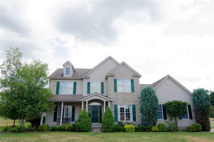 Stunning home in The Reserves at Harvest Hill.  This beautiful large corner lot is the envy of the neighborhood, with 4 bedrooms, 2.5 car garage and tons of parking.  The large ceramic floored foyer leads you directly into the amazing open kitchen.  Sparkling quartz countertops, gorgeous hardwood floors and a massive center island.  The kitchen opens to a spacious eating area and the family room.  Vaulted ceiling, natural lighting and the stone fireplace makes the perfect entertaining and hang out spot.  The first floor also offers a large half bath, laundry room, pantry, cozy study with built in book shelves and a formal living and dining room.  On the second level you will find a beautiful master bedroom with master bath, 3 additional bedrooms and full bath.  Master and main bath have been completely updated with bamboo flooring, marble and granite top vanities and backsplashes.  Master bedroom has a vaulted ceiling, reading nook, walk in closet & a full wall of custom cabinetry.  Al
