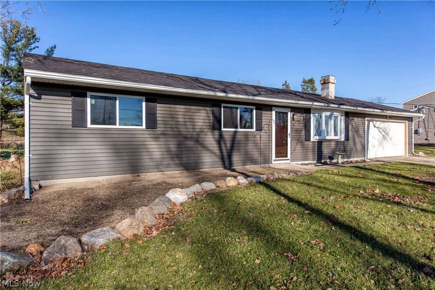 This is the home you've been waiting for! Enjoy one floor living at it's best in this beautiful, completely remodeled Streetsboro ranch home. Located in the desirable Arrowhead development, this 3 bedroom ranch sits on a half acre lot on a quiet street. Minimal traffic, great walking area, child friendly. As you enter the home, you'll appreciate the new open floor plan. The large living room has an electric fireplace, bay window, brick front hearth, new carpeting and built in shelving. The eat in kitchen is stunning and boasts new, all wood designer cabinetry, and dark bamboo wood floors with Dry-Cor sub-flooring. Beautiful glass pendant and LED recessed lighting, designer sink, gorgeous counters, and glass tile back splash finish off the kitchen. A laundry room with built in cabinetry and a beautiful new half bath and pantry are nearby. Every room has been freshly painted with neutral colors, new interior doors, and crown moldings. Both baths have a fresh look, with updated tile, coun