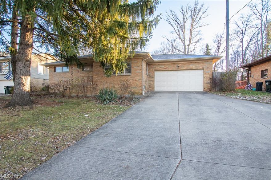 All Brick one story ranch situated on a deep park like lot! 3/4 bedrooms and 2 full baths. Neat family room addition that features a sandstone walled wood burning fireplace, heated floors, walls of windows and beamed ceiling! Eat in kitchen has plenty of cabinet and counter space and comes fully applianced. Large lower level could be a separate living quarters. It has a spacious rec room with new carpet and a possible 4th bedroom/ office and a full bath. Oversized 2 car attached garage and an extra side parking pad. Recent big ticket updates include new roof, chimney's tuck pointed, and new carpet in the lower level all 2023. Panel box, furnace / central air, glass block windows within a few years. Bring your finishing touches. To be sold as is.