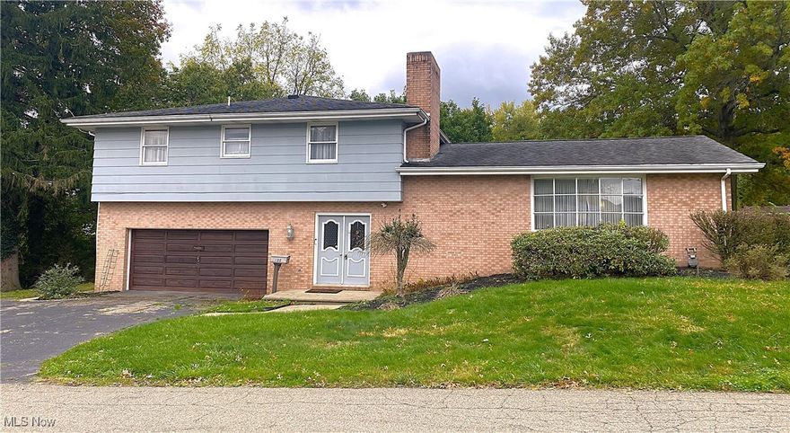 Welcome to this One Owner Tri-Level home located at 105 Franklin St., St. Clairsville. This 4-bedroom home has city utilities.  The main Entry invites you into the 1st level that consists of the Family Room, Laundry Room and a Full Bath. There are sliding glass doors leading out to a covered patio overlooking the level back yard. Just a few step up from the family room you are in the charming fully equipped Eat-In Kitchen. Conveniently off the Kitchen is the Formal Dining Room and Large Living Room with Lovely Bow Window and Gas Log Fireplace. The home has two chair lifts to allow anyone with limited mobility have the freedom to enjoy this home. The 3rd Level Hallway is very wide and leads to 4 very nice size bedrooms. Ladies will really like the makeup dressing table with lots of mirrors in the main bathroom. There is a master bedroom with double closets and a master bath. This home has 3 full baths. The full basement has great storage, and the oversized Double Car Garage enters into the laundry room and also the main entry.