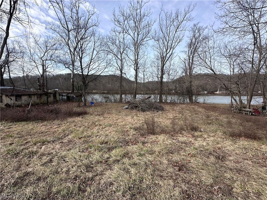 Serene Muskingum Riverfront Lot - Ideal Retreat!

Description:

Discover the perfect retreat with this Muskingum Riverfront lot, located just north of McConnelsville on State Route 60. This property offers a unique blend of natural beauty and potential, featuring a vintage block cabin that whispers stories of the past.

Key Features:

Riverfront Bliss: Embrace the tranquility of Muskingum River as it gracefully meanders through your backyard. The flat lot provides easy access to the water, creating an ideal spot for fishing, kayaking, or simply enjoying the soothing river ambiance.

Vintage Block Cabin: The property comes with an old block cabin, adding character and charm to the landscape. This structure has the potential for renovation, making it a canvas for your creative vision or a rustic retreat with a touch of history.

Scenic Surroundings: Immerse yourself in the natural beauty of the surroundings. The flat lot offers an excellent opportunity for landscaping and creating your personalized outdoor oasis.

Selling As-Is, Where-Is: This property is being sold As-Is, Where-Is, providing a unique chance for buyers to customize and upgrade according to their preferences. Seize the opportunity to make this riverfront gem your very own.

Location Highlights:

Situated just north of McConnelsville, this location provides a perfect balance of serenity and convenience. Enjoy the peaceful retreat while having easy access to State Route 60 for quick journeys to nearby amenities and attractions.

Don't miss out on the chance to own this Muskingum Riverfront lot with a vintage cabin – a haven waiting to be rejuvenated. Seeking a weekend getaway? This property holds the potential for a truly enchanting lifestyle.

Schedule a showing and envision the possibilities today! Due to the flood zone a home or septic system cannot be put on this land.