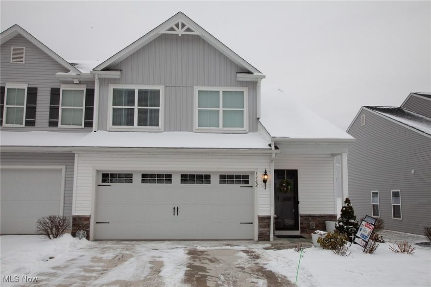 Welcome to this stunning 4-bedroom, 2.5-bath end-unit townhome, perfectly positioned on an oversized premium lot in the highly desirable Forest Lakes community of Uniontown. From the moment you step inside, you’ll appreciate the bright, open-concept design featuring 9-foot ceilings and a seamless flow between living spaces. The main level impresses with new porcelain tile flooring, custom recessed lighting, and a spacious living and dining area ideal for gatherings. The chef-inspired kitchen offers a gas range, Bosch dishwasher, and stylish modern finishes—perfect for cooking and entertaining. Upstairs, you’ll find gleaming hardwood floors in the hallway, plush luxury carpeting in the bedrooms, and porcelain tile in the bathrooms. Additional updates include fresh paint throughout and upgraded doors, adding a refined touch to every room.
Step outside to the extended patio, offering plenty of space for relaxing, grilling, or hosting friends. Residents of Forest Lakes enjoy access to a community park, playground, pavilion, and walking trail, creating the perfect balance of nature and neighborhood living. Located in the award-winning Green Local School District and just minutes from shopping, dining, and major highways, this home delivers the ideal mix of comfort, quality, and convenience.Don’t miss your opportunity to call this move-in-ready townhome your own in one of Uniontown’s most desirable neighborhoods!