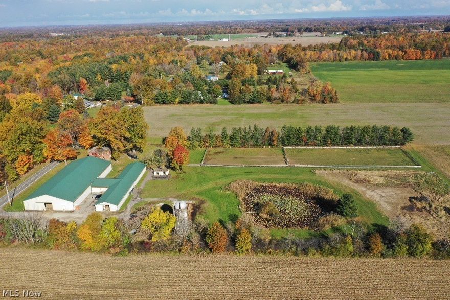 Welcome to The Stables At Windy Acres, a turn key income producing equine boarding and training facility. Offering 26 total stalls, 22- 10’x10’, 1-12’x10’, 1-10’x8’ and two 12’x12’ stalls with all weather runs. Oversized 150’x76’ indoor arena with state-of-the-art dust free footing. A 340 sq. ft. finished and fully
furnished viewing room to overlook the arena. Recently added feed room with plenty of storage. Newly designed hot/cold wash rack with sink. Custom tack lockers (26) equipped with saddle racks and bridle hooks. Property currently has two oversized pastures for use. Additional Improvements with in the last three years include extensive earth work to the grounds, levelling and fully matting all stalls, ‘all weather’ walkways on grounds, adding new daily use equipment, reworked/ added and treated arena footing (dust free) and more lighting. No Trespassing! Showings only with a licensed Realtor! PROPERTY IS OWNED BY LICENSED REALTOR.