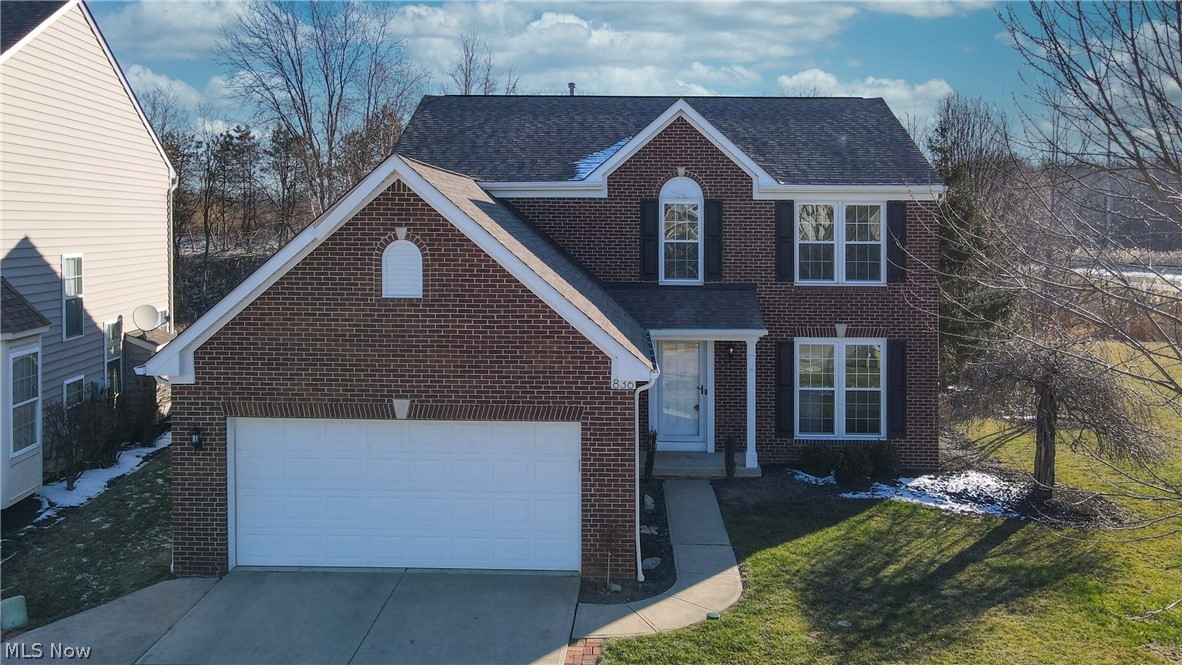 This wonderful Avon Lake center hall colonial is ready for a new owner! Conveniently located near highways, businesses, Lake Erie, Crocker Park for shopping and in the award-winning Avon Lake CSD. The curb appeal will make you fall in love with a full brick front elevation and the private paver patio in the backyard which is great for entertaining guests or spending time with family. The interior of this home has recently been updated with all the modern conveniences that homeowners desire, hard wood floors throughout, white shaker cabinets, tile backsplash, kitchen peninsula seating, stainless steel appliances, recessed lighting and a finished rec room in the basement. The owner's suite includes a walk-in closet lined with built ins, a bath with dual vanities and a walk-in shower, three other bedrooms and a hallway full bath round out the second floor. Additionally, all rooms and ceilings in this home have been painted with neutral tones (2022), new carpet in the bedrooms (2022) and a