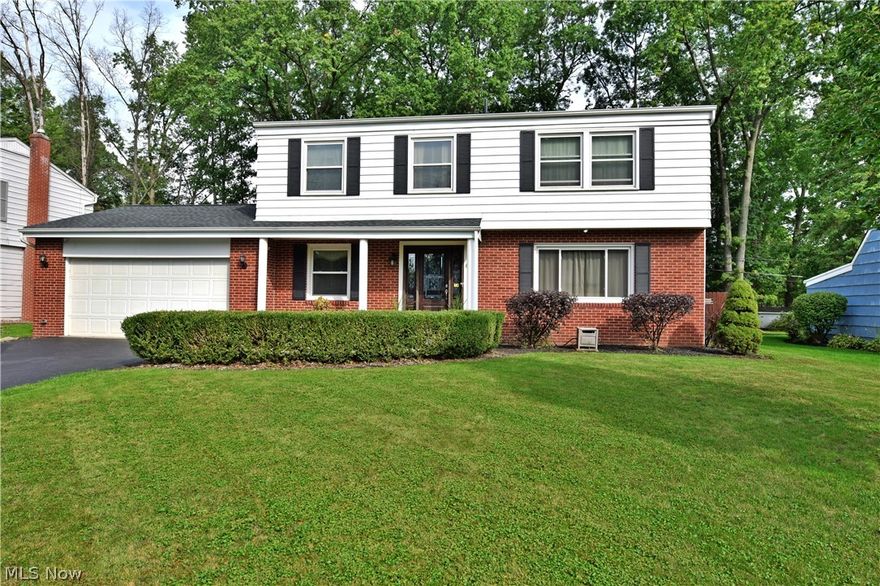 Your search ends today! This beautiful turnkey two-story home has everything your growing family has been looking for. A multitude of bedrooms, huge fenced in backyard and a partially finished basement ensure that you'll never be out of room. Set in the Eastgate Development in a quiet Howland neighborhood, this residence stands tall with a half brick facade and well-kept landscaping. The real treat is around back where an expansive rear deck makes for the perfect outdoor lounge with stepping stones leading to a fire pit perfect for the cool summer and fall nights. Inside the home, natural light fills the foyer through an ornate glass front doorway. A decadent living room boars rich hardwood flooring and an oversized window creating a welcoming atmosphere. A half bath can be found before entering the sweeping kitchen where dark stained wood cabinets give a rich look. Nearby, a newly carpeted family room offers a pair of French doors showcasing backyard views and rear patio entrance. Ups