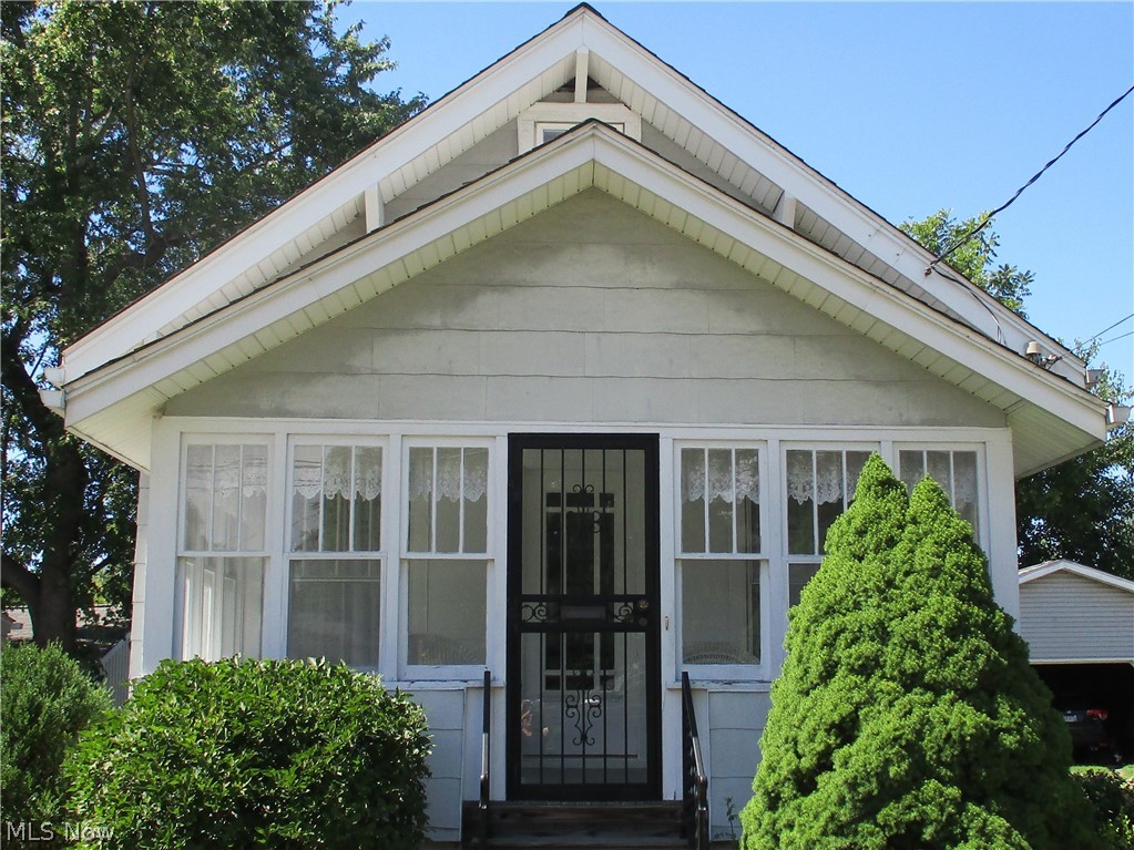 Welcome to the Barberton Bungalow with the bathroom you have always dreamed of. This 1 bedroom home has been very well maintained as is ready to move right in. The enclosed front porch will welcome you and give you an amazing space to relax. There is a nice sized living room, dining room and bedroom all on the first floor, making for great one floor living. The bathroom has been enlarged and updated with plenty of storage. Make sure you check out the attic and use your imagination to make this amazing space your own. It can be used for storage, an office, a craftroom...you decide how to you this generous space. The kitchen is quaint and welcoming with plenty of room with a nice sized pantry. Right off the kitchen is a spacious deck to have a cookout or just soak in the sun. Call now for a private tour.