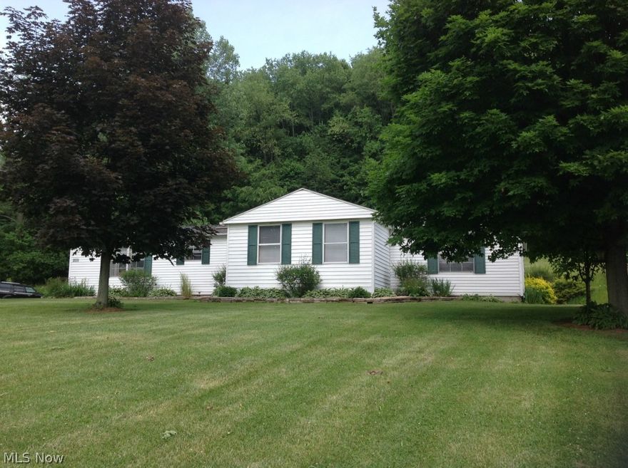 Country living at its finest. This one story 1560 sq ft home on 5.5 acres offers 3 bedrooms, 2 baths, attached garage and private deck, woods and beautiful view across the valley.