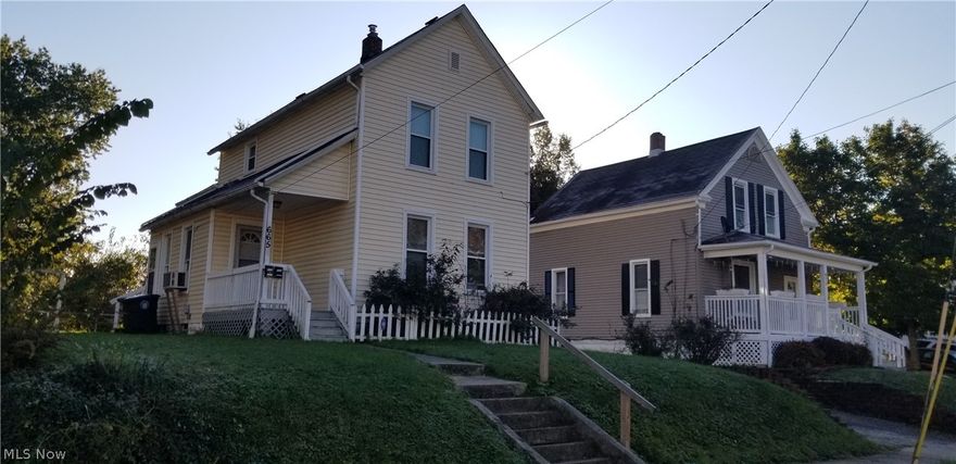 Clean two unit in Akron U Area.  Many updates in the last 3 years (flooring, kitchen, carpet).    Appliances include one washer and dryer, 2 full size refrigerators, 1 full size stove, 1 apartment size stove.  Property has driveway with garage plus side yard for parking.