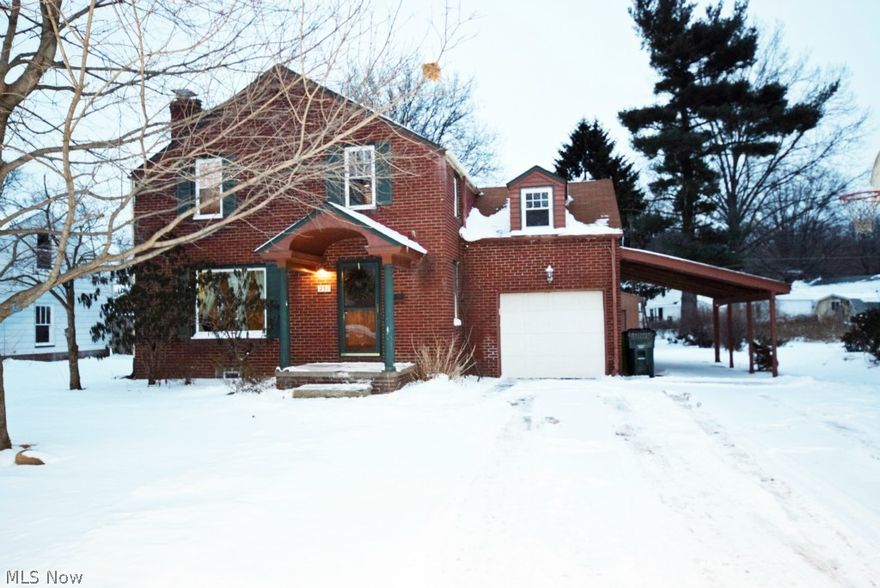 Look at this Brick Colonial. 4 Bedroom, move-in-ready, great hardwood floors throughout! You won't find more house and garage for the price! One car attached + 2 car detached garage + 1 car attached carport.  Great kitchen which opens to the dining room and spacious living room with fireplace. Basement includes finished rec room, laundry area and unfinished half bath. Don't wait 'til it's sold, schedule your showing today!