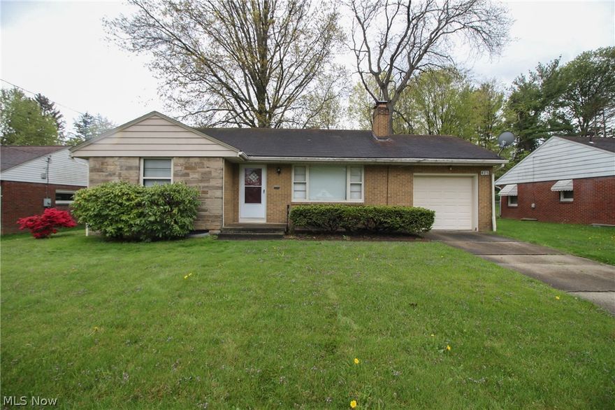 ATTENTION INVESTORS! Looking for a new project, well here it is! House needs TLC, but will be a perfect home or rental. Living room has large picture window and fireplace. Hardwood floors in living room, dining room and bedrooms. Vintage tile in the bathroom if you like that 50's look. Newer furnace and plumbing. Attached garage. Nice backyard. Full basement.