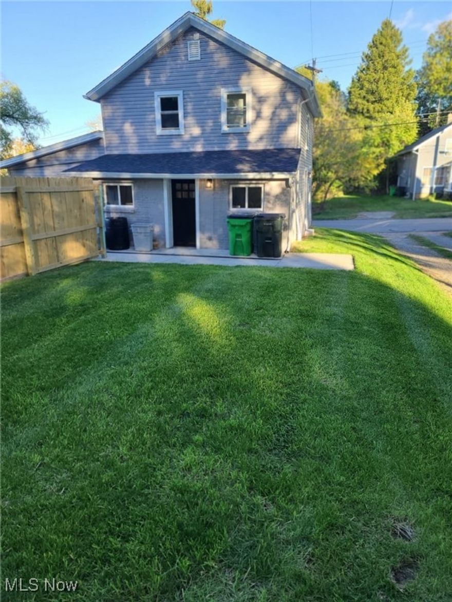 You won’t believe it’s the same house! Stunning top-to-bottom updates make this home feel brand new inside and out. The completely remodeled kitchen features beautiful granite countertops and a polished backsplash, creating a bright, modern space you’ll love. The entire home has been updated with all-new plumbing, wiring, drywall, insulation, doors, paint, and flooring, along with numerous new windows that flood the home with natural light. Enjoy the convenience of first-floor laundry and off-street parking, making everyday living easy. Fresh interior and exterior paint paired with new siding give the home fantastic curb appeal, while a new roof and gutters add long-term peace of mind. A privacy fence creates the perfect outdoor retreat. With 3 bedrooms and 2 full baths, this home is truly move-in ready. Best of all, it sits directly across from a park, offering open views and easy access to outdoor fun—this one is an absolute must-see!