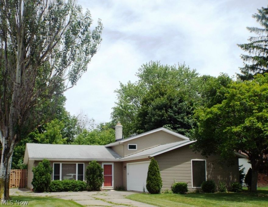 Great location for this updated 3 Bedroom Split Level.  Neutral décor throughout.  Large family room with full brick wall with wood burning fireplace. Updated eat-in kitchen comes with all appliances.  Dining room features a sliding door that leads to private fenced backyard with nice patio & shed! Huge laundry room complete with washer and dryer. Newer windows and doors throughout entire home.  Newer vinyl siding & furnace.  Call today to schedule a private showing!