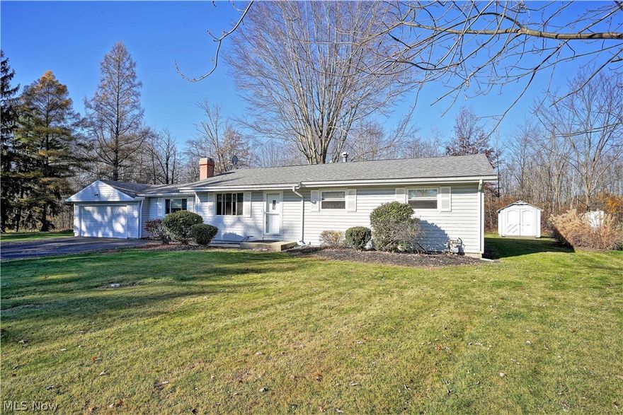 WELCOME HOME to this stunning three bedroom, one and a half bath Ranch Home on a huge half acre lot; it's the biggest lot in the neighborhood, nice and private! In 2006 the kitchen was remodeled with corian counters, and lovely kraft made cabinets with plenty of storage, as well as the half bath, laundry room, new fixtures and new tile floors. Nice open dining room located off the kitchen and living room area, with sliding glass doors to let the natural light to shine through and lead you out onto the large deck. Step down into the family room with gleaming hardwood floors, recessed lighting and a cozy corner gas fireplace. As you proceed down the hall there is a nice size linen closet along with the bathrooms and the three bedrooms. A 266 square foot addition completed in 2008 with maple hardwood flooring, is very well insulated. The furnace/hot water and A/C were replaced in 2006. There is electric and gas and hookups for both in the home. A new roof was installed in 2011, as well as