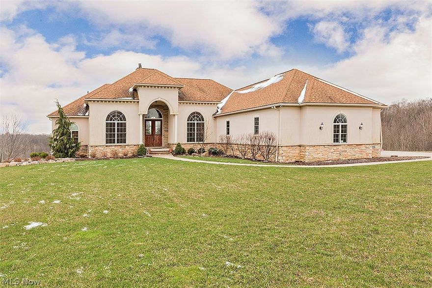 WONDERFUL PRICE REDUCTION !!! This Spacious home sits on top of a hill overlooking peaceful green space in lovely Sterling Glen.  Award winning school system, easy access to major highways and close proximity to excellent dining, shopping and entertainment, but away from the hustle & bustle. The open spacious floor plan is perfect for todays style of living. with vaulted ceilings and over 7,200 square feet of finished living space! The gourmet kitchen opens up to a huge deck that overlooks one of the original polo fields, and you will be able to enjoy an occassional game of polo. All of the major mechanical systems (furnace, high efficient tank-less water heater etc) are newer and has been maintained flawlessly. The Master Suite is exceptional with an abundance of closet space & a Jacuzzi to relax in at the end of a busy day. Then enjoy a movie in your private movie theatre. This home has neutral decor throughout and allows for one floor living, if you so choose. Make this your dream h