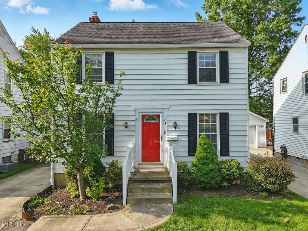 *** Offer Deadline - All offers dues by 6pm on Sunday (6/8) *** Welcome to 124 Hayes Avenue, a classic Colonial nestled in the heart of Cuyahoga Falls' beloved "Presidential Streets" neighborhood. This 3-bedroom, 2-bathroom home blends timeless charm with modern updates. A bold red door and black shutters create standout curb appeal, while inside, wide plank laminate flooring flows throughout the main level. The bright living room with crown molding leads into a formal dining room with a cozy breakfast bar that opens to the kitchen, featuring warm wood cabinetry, stainless steel appliances—including a new Bosch dishwasher—and under-cabinet lighting. Upstairs, all three bedrooms offer rich-toned laminate flooring and share an updated full bath with tiled tub/shower and newer vanity. The finished basement adds flexible living space with a rec room, built-in desk area, and a second full bathroom with a walk-in shower—ideal for guests, work-from-home setups, or a cozy media space. Step outside to a spacious backyard with a concrete patio, playset, and a storage shed—perfect for outdoor entertaining or relaxing afternoons. Major updates include a new HVAC system (2023), new stair carpet (2025), washer/dryer (2020), smart thermostat, and smart switches. Conveniently located near shopping, dining, highway access, and parks—including Cuyahoga Valley National Park—and within the Cuyahoga Falls School District (new high school opens next year), this home offers comfort, convenience, and character in one warm and welcoming package. Schedule your private showing today!