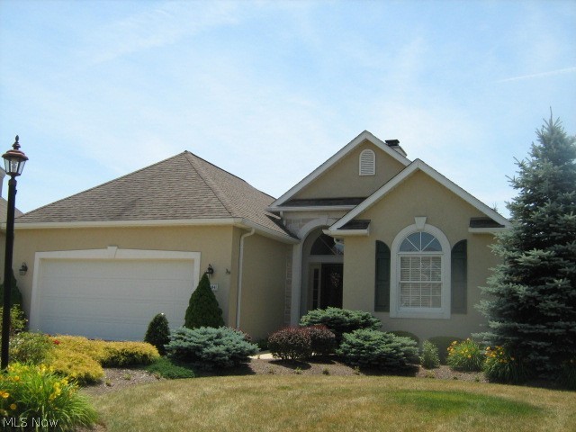 PRISTINE freestanding RANCH cluster home with many custom features to maximize space and comfort offers 1-floor living at its best! Very open with tray & vaulted ceilings, neutral decor. Spacious fireplaced great room - end bonus room opens to private 7x10 deck with remote control awning. Eating area has built-in bay window. Master suite has walk-in closet with extra closet in master bath complete with skylight, twin sink vanity and roomy shower with built-in seat. Super laundry room with built-in cabinets, counter and stationary tub. Ceiling fans thruout. All appliances included. Full, dual-steel beam constructed basement has extra course of block to accommodate finishing, plumbing in for bath.