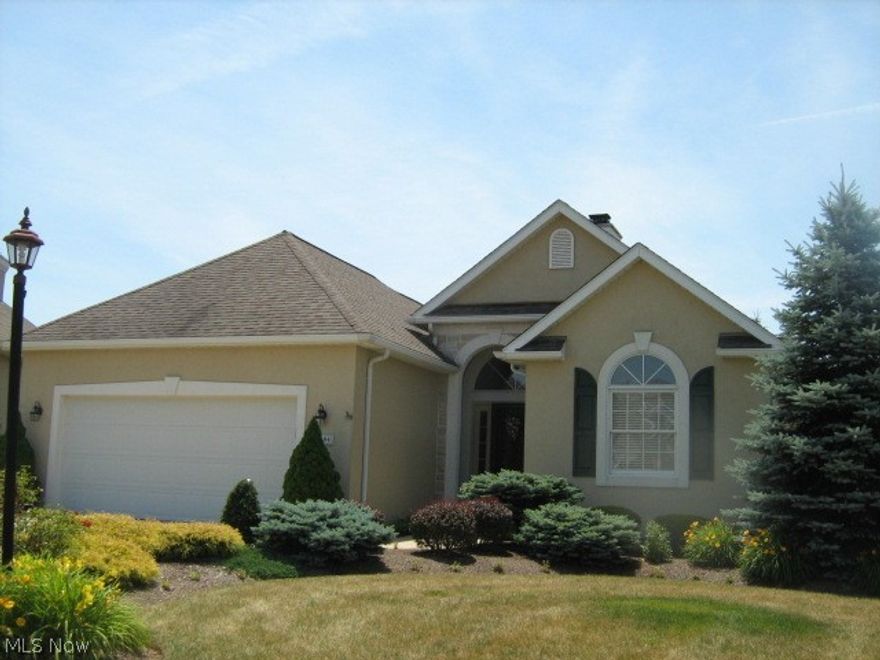 PRISTINE freestanding RANCH cluster home with many custom features to maximize space and comfort offers 1-floor living at its best!  Very open with tray & vaulted ceilings, neutral decor.  Spacious fireplaced great room - end bonus room opens to private 7x10 deck with remote control awning.  Eating area has built-in bay window. Master suite has walk-in closet with extra closet in master bath complete with skylight, twin sink vanity and roomy shower with built-in seat.  Super laundry room with built-in cabinets, counter and stationary tub.  Ceiling fans thruout.  All appliances included.  Full, dual-steel beam constructed basement has extra course of block to accommodate finishing, plumbing in for bath.