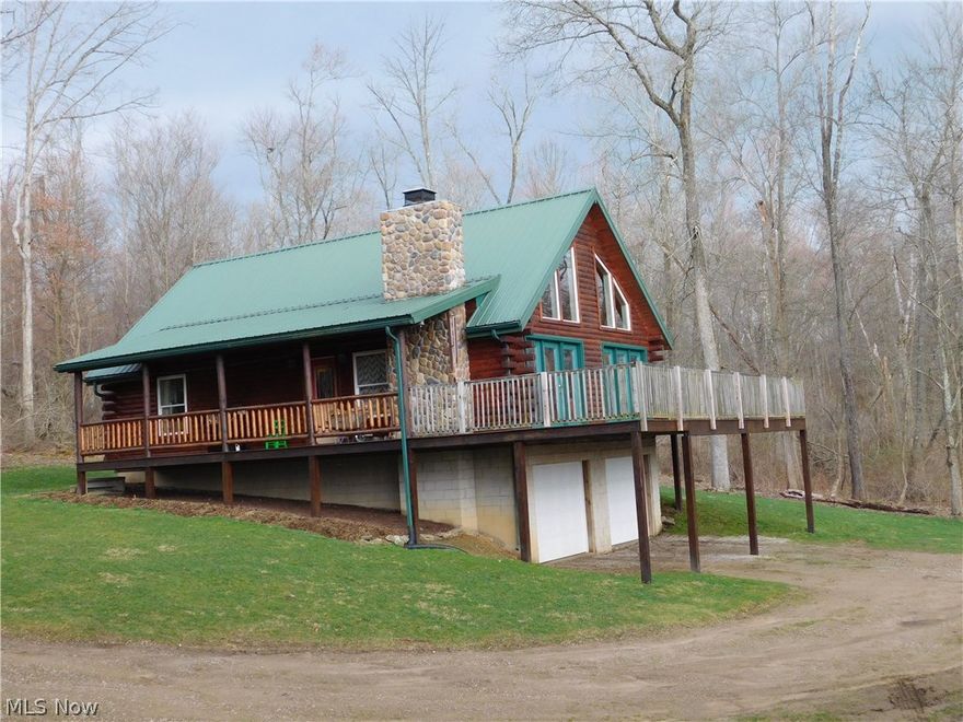 Secluded Log Home on 5+ acres. Quality built 3 bedroom, 2 bath cabin with Hickory kitchen and cement countertops. The exterior was treated and resealed in the summer 2015. The cabin offers an open floor plan with a loft area overlooking the main floor including the stone fireplace. Tongue and Groove ceiling, metal roof, wrap around porch completes this one of a kind property. 24x24 pole building.