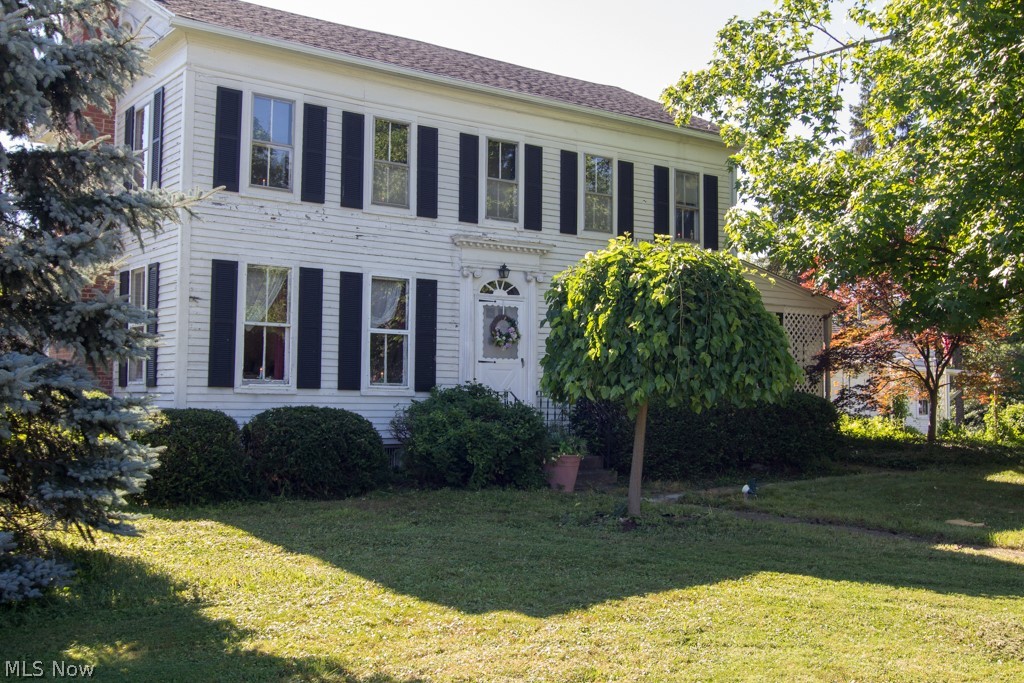 This 1860's Greek Revival Home features approximately 1920 sq. ft. including 4 bedrooms, 2 full baths, kitchen and dining room, living room with fireplace and a separate Parlor, a full basement with workshop, 2 car attached garage, small outdoor shed and a walk up Attic all situated on 1.5 acres of land in Rootstown Township. Tons of Historic Charm!