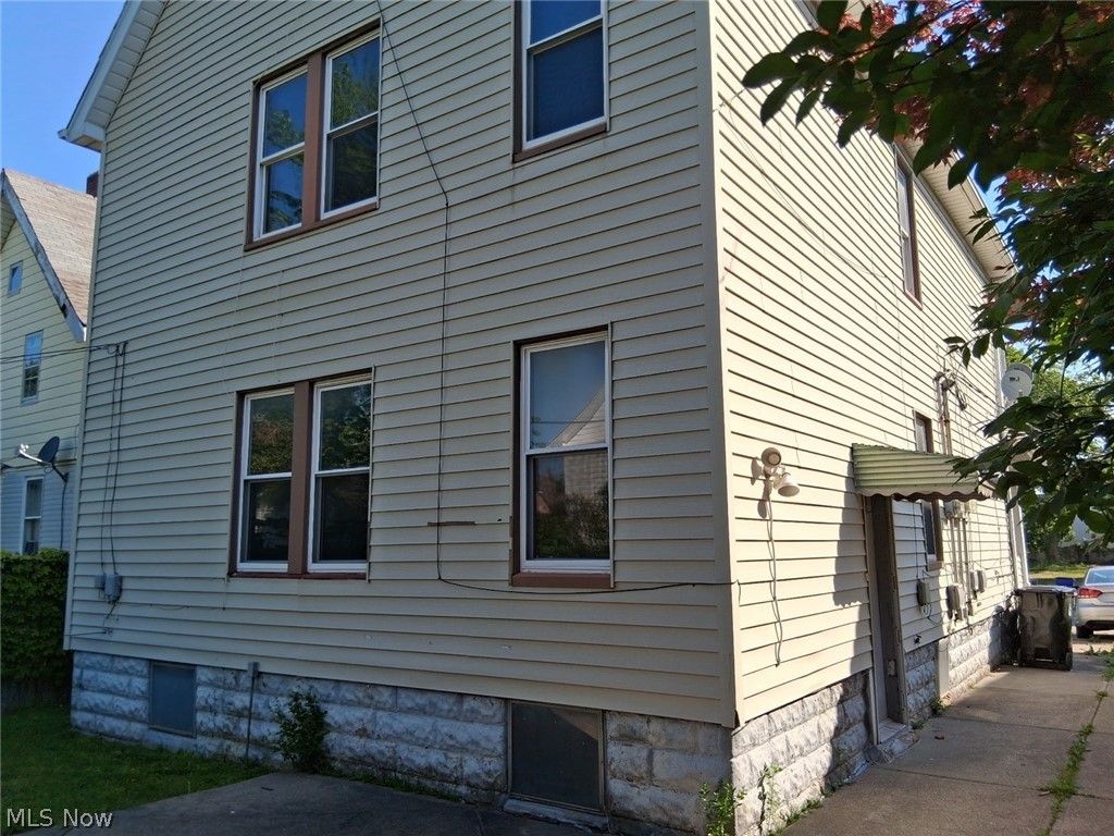 Photo of 930 Evangeline Road, Cleveland, OH 44110 (MLS # 5212215)