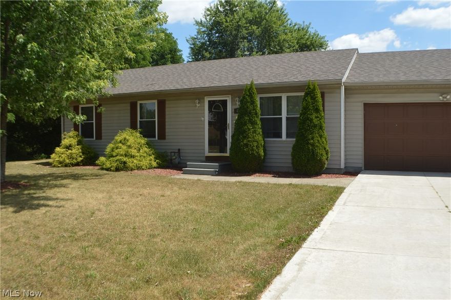 One floor living, in this sharp ranch. This home offers newer roof and windows, and nice neutral decor.
3 bedrooms, a refreshed bathroom, first floor laundry room right off the kitchen, your kitchen features the popular white cabinetry and wood laminate flooring.  From the  kitchen sliding glass doors lead to your very private large deck and spacious backyard all fenced in.  Convenient access from garage to kitchen.  Ample parking with wide concrete drive and 2 car attached garage.  Area of newer homes near Elson Park.  Interest rates are spectacularly low, why rent?